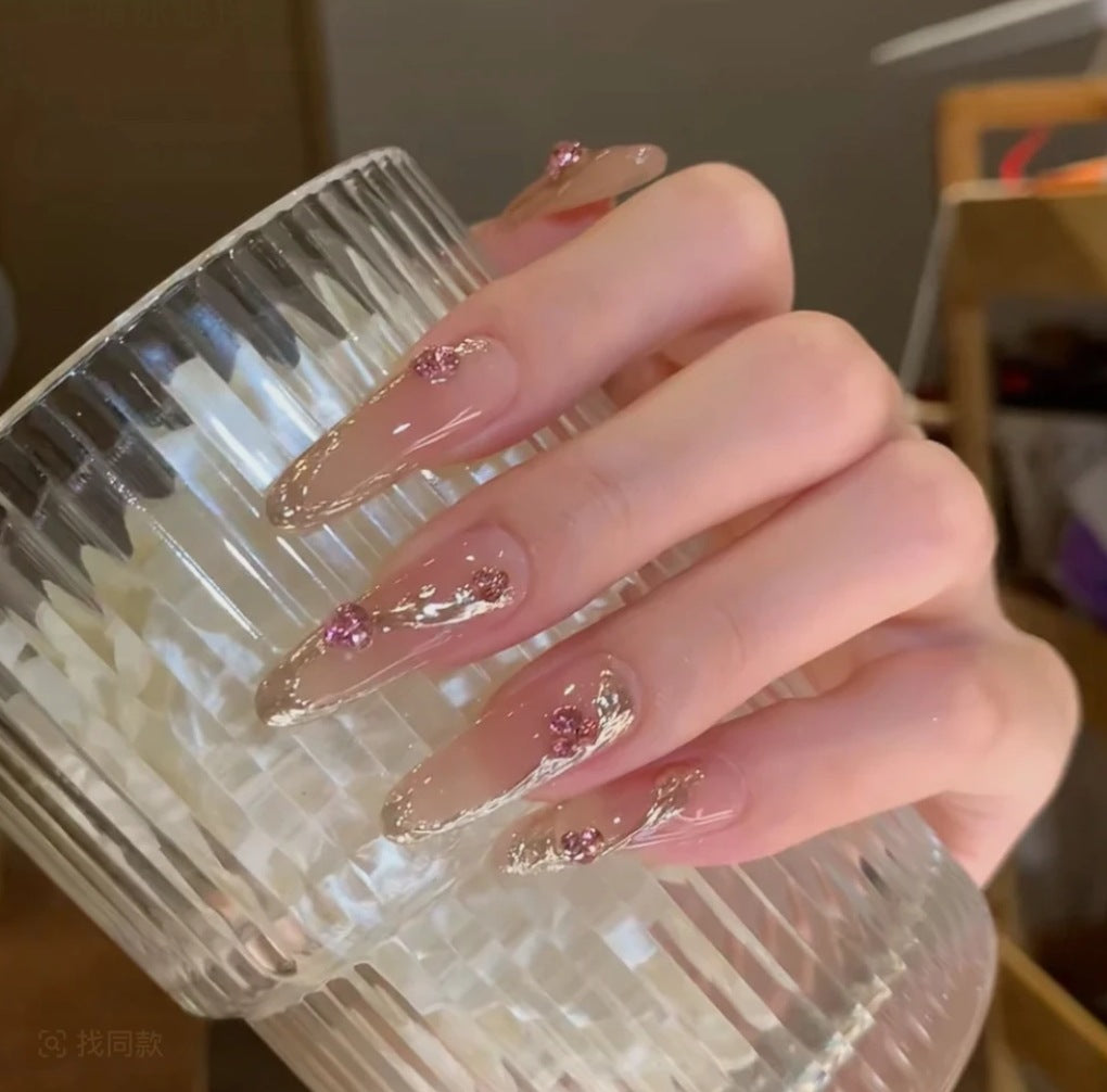 Decorative Acrylic Nail Extensions with Floral Accents