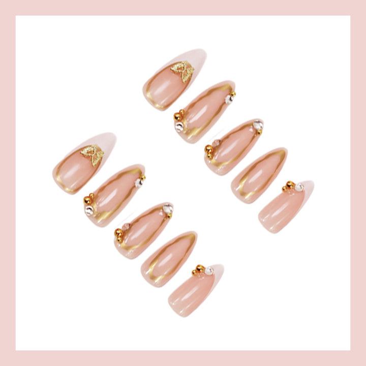 Artificial nail set with elegant gold accents and luxurious decorations Kalsten