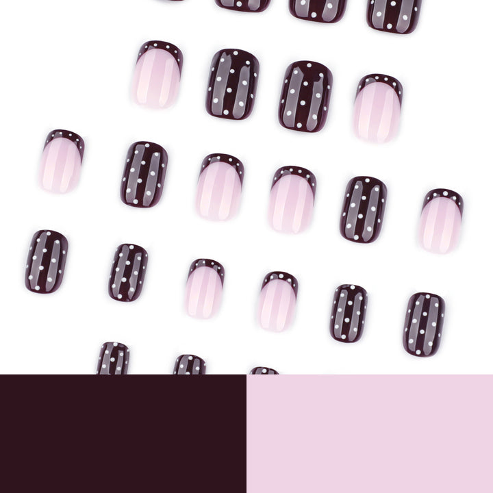 Artful nail art with elegant polka dot design Kalsten