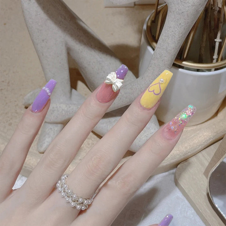 Artful Gel Nails with Elegant Floral Design and Glitter Accents Kalsten