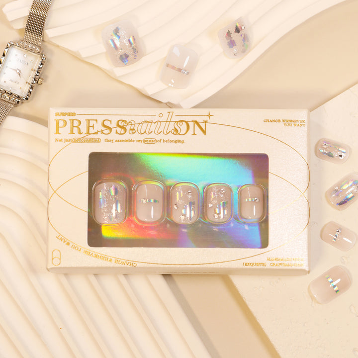 Artful Nail Art with Glitter Accents and Elegant Details Kalsten