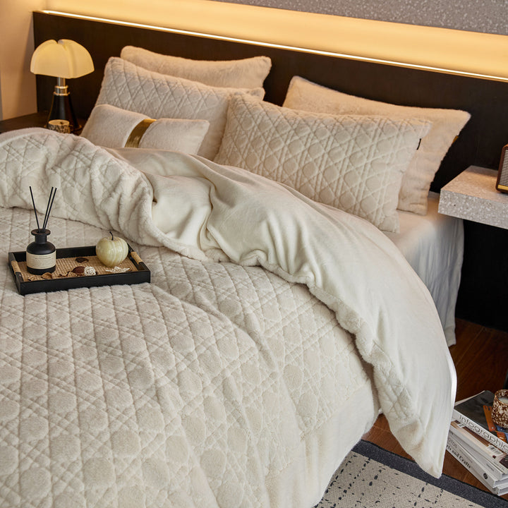 Quilted bedding set made of soft microfiber with diamond stitching