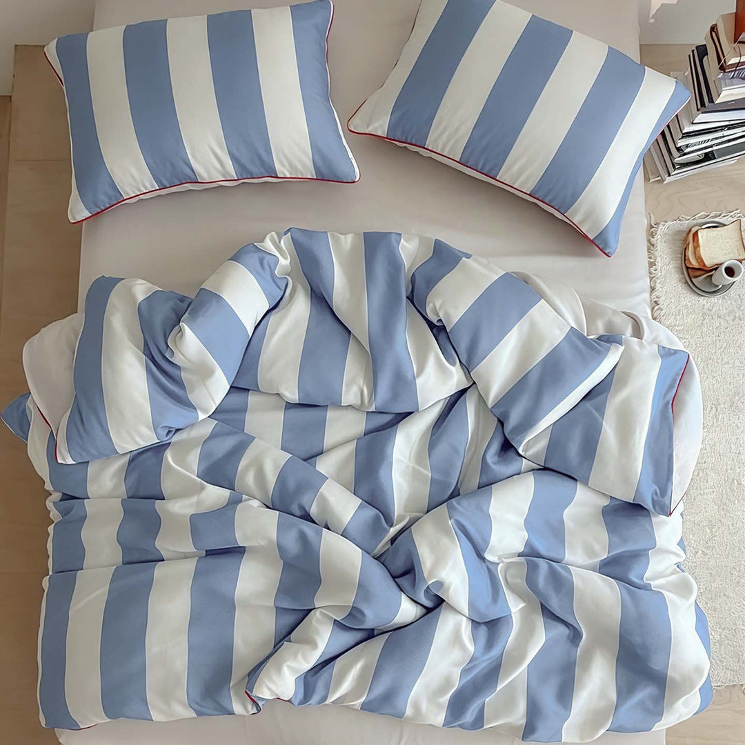 Luxurious cotton satin bedding set with fine striped pattern and piping