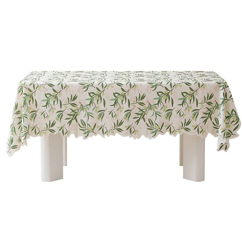 Round wipeable tablecloth with floral cut-out hem Kalsten