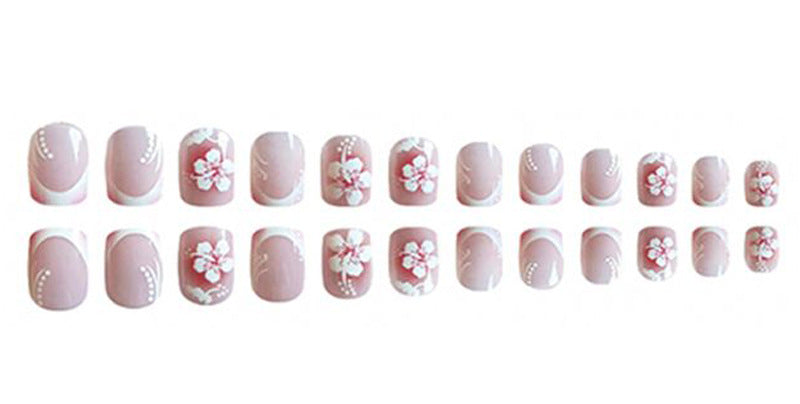 Acrylic nail set with elegant flower and French tip designs Kalsten