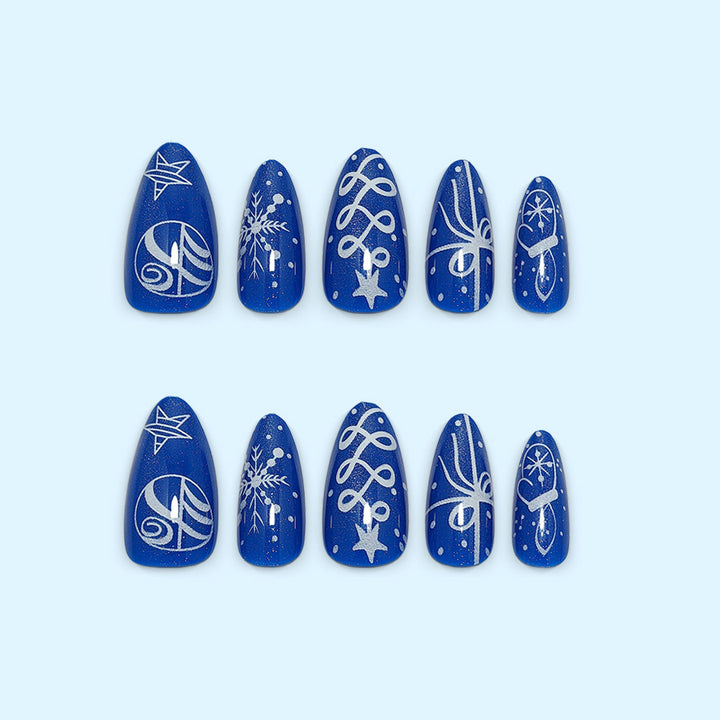 Artificial nails in festive winter design with glittering snowflakes and elegant decorations Kalsten
