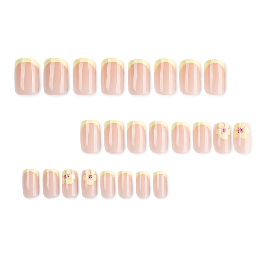 Artistic French-tip nails with floral decorations Kalsten