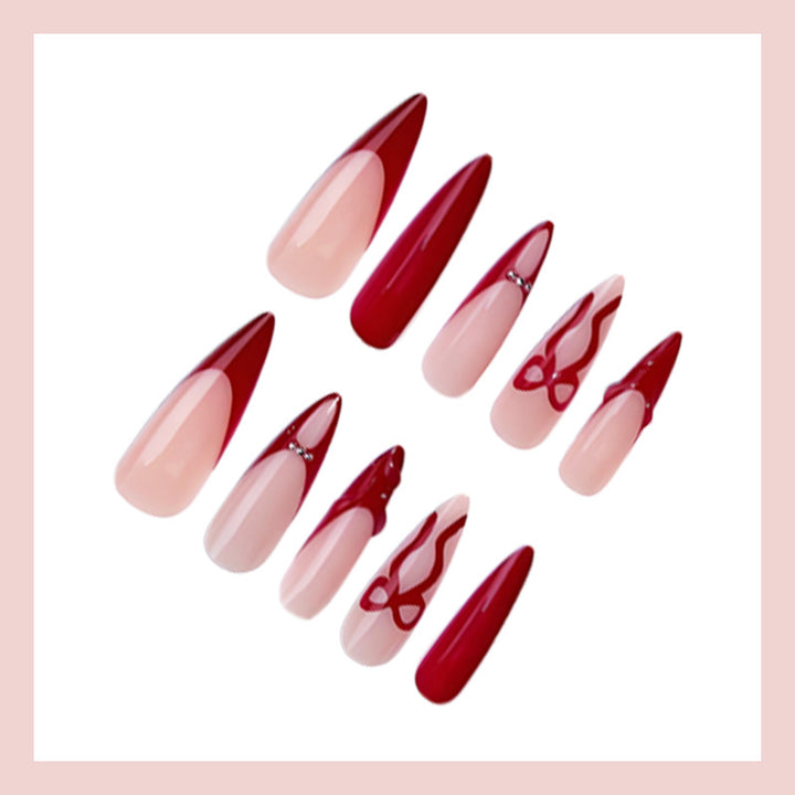 Artificial nails with elegant pointed designs and creative embellishments Kalsten
