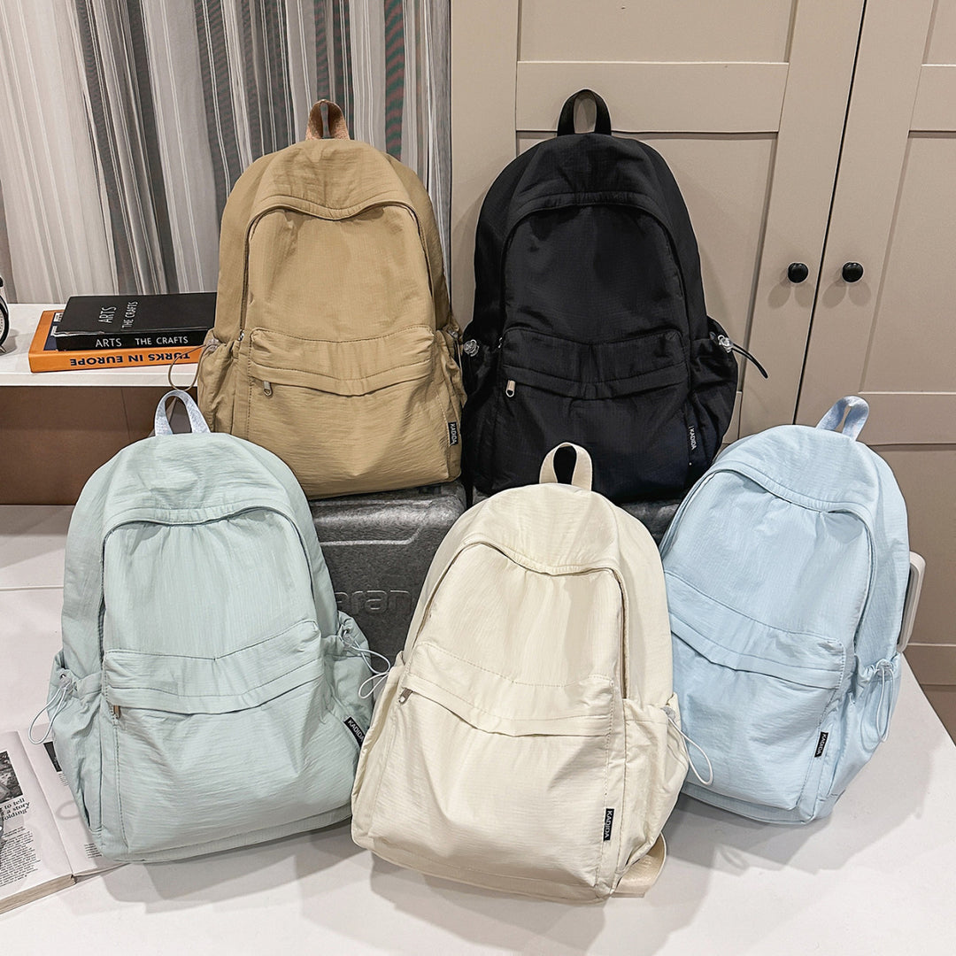 Sporty backpack with practical side pockets Kalsten