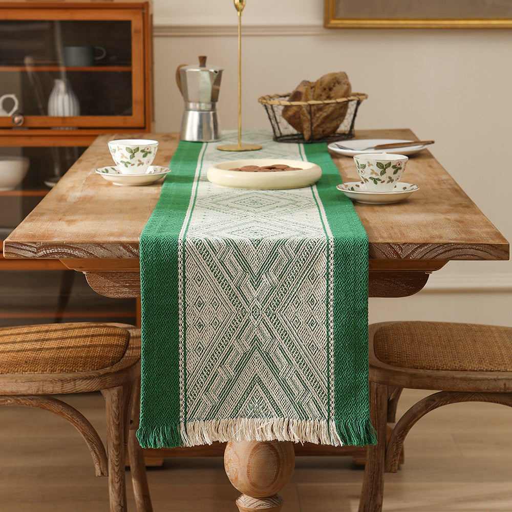 Woven table runner with geometric ethnic ornament and fringes Kalsten