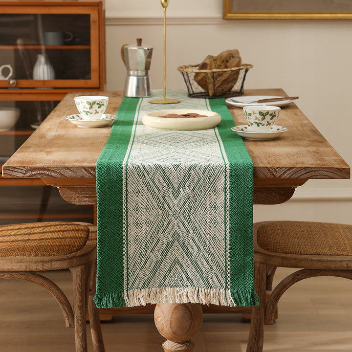 Woven table runner with geometric ethnic ornament and fringes Kalsten