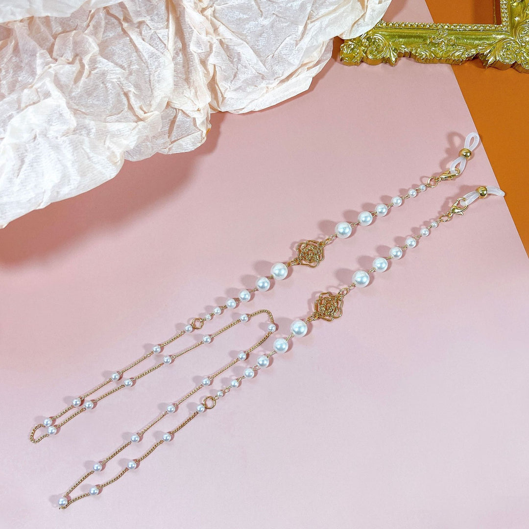 Sparkling glasses holder chain with pearls and floral pendants Kalsten