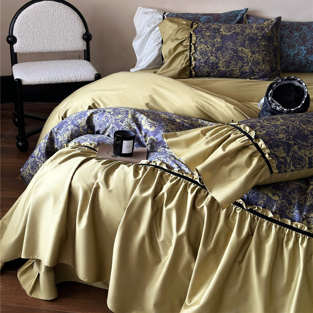 Reversible luxury bedding set made of cotton satin with gathered ruffle, floral jacquard inner side and contrasting velvet piping