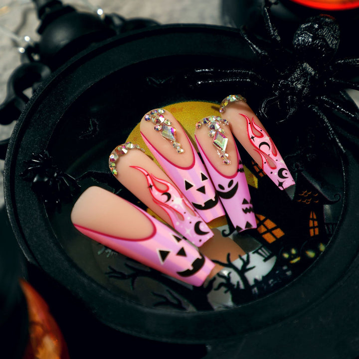Artificial nail art with festive design and glitter variations Kalsten