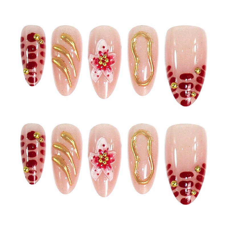 Creative nail art set with floral embellishments and glamorous accents Kalsten