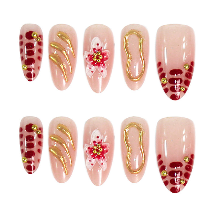 Creative nail art set with floral embellishments and glamorous accents Kalsten