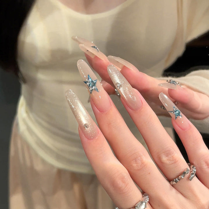 Glamorous artificial nails with star accents Kalsten