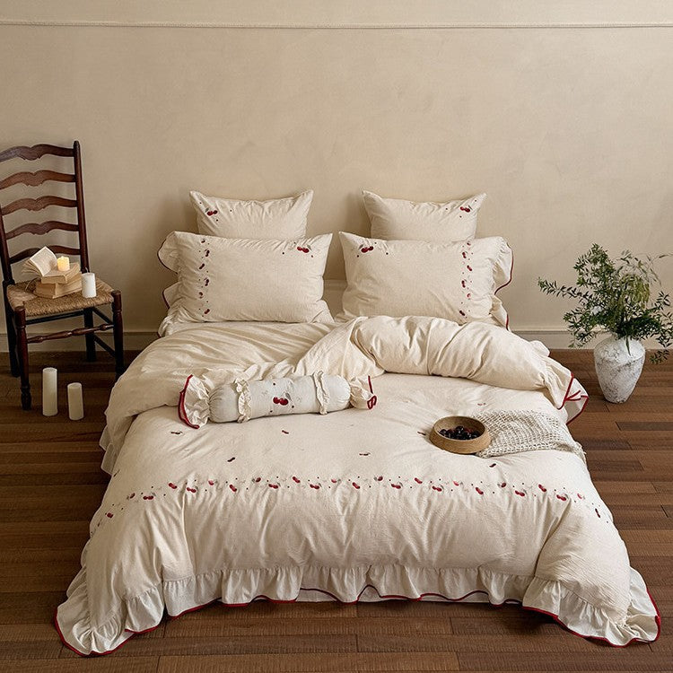 Bedding set with delicate cherry embroidery, ruffle and linen look