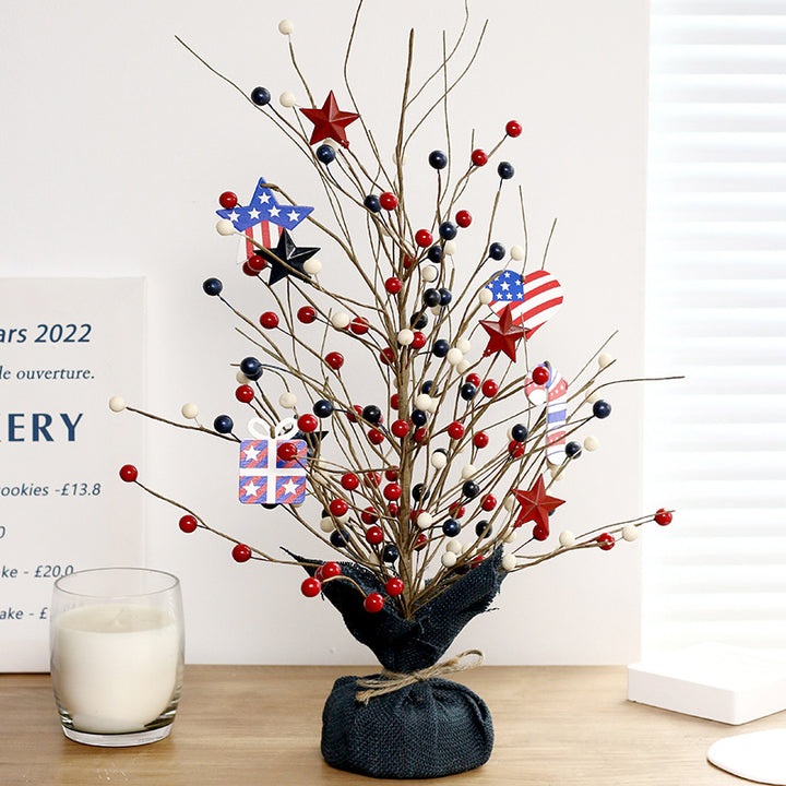Unisex rustic table arrangement with star and berry branches as focal decoration Kalsten