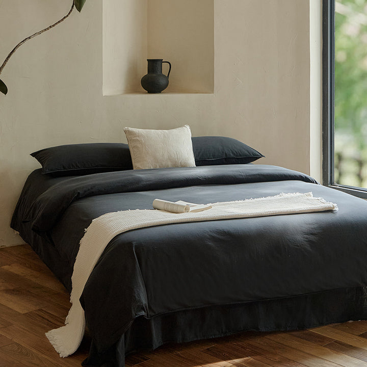 Linen bedding set with duvet cover, pillowcases and bed skirt