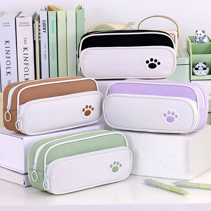 Pencil case with double compartment design and playful paw print motif Kalsten