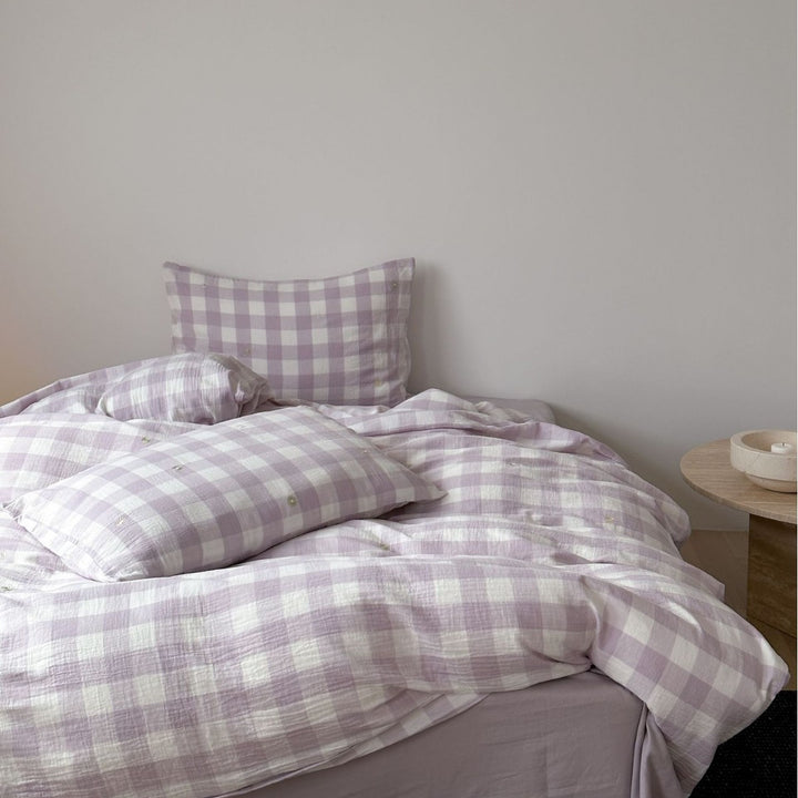 Cotton duvet cover set with fine pinstripes and subtle embroidery applications