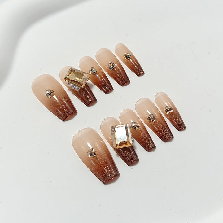 Artificial nails with elegant ombre effect and exquisite gemstones Kalsten