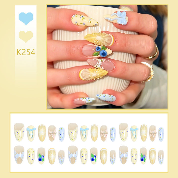 Artificial nails with playful floral design Kalsten