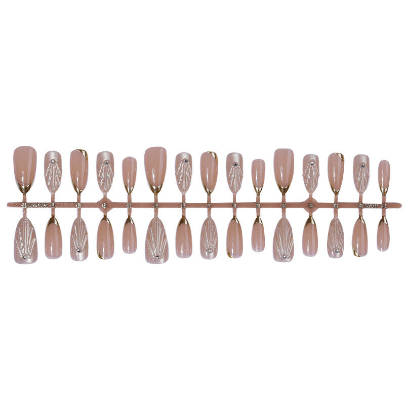 Artificial nail set with elegant shell design and glitter accents Kalsten