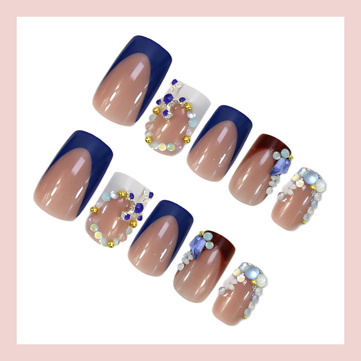 Artificial nail set with elegant stone embellishments and modern accents Kalsten