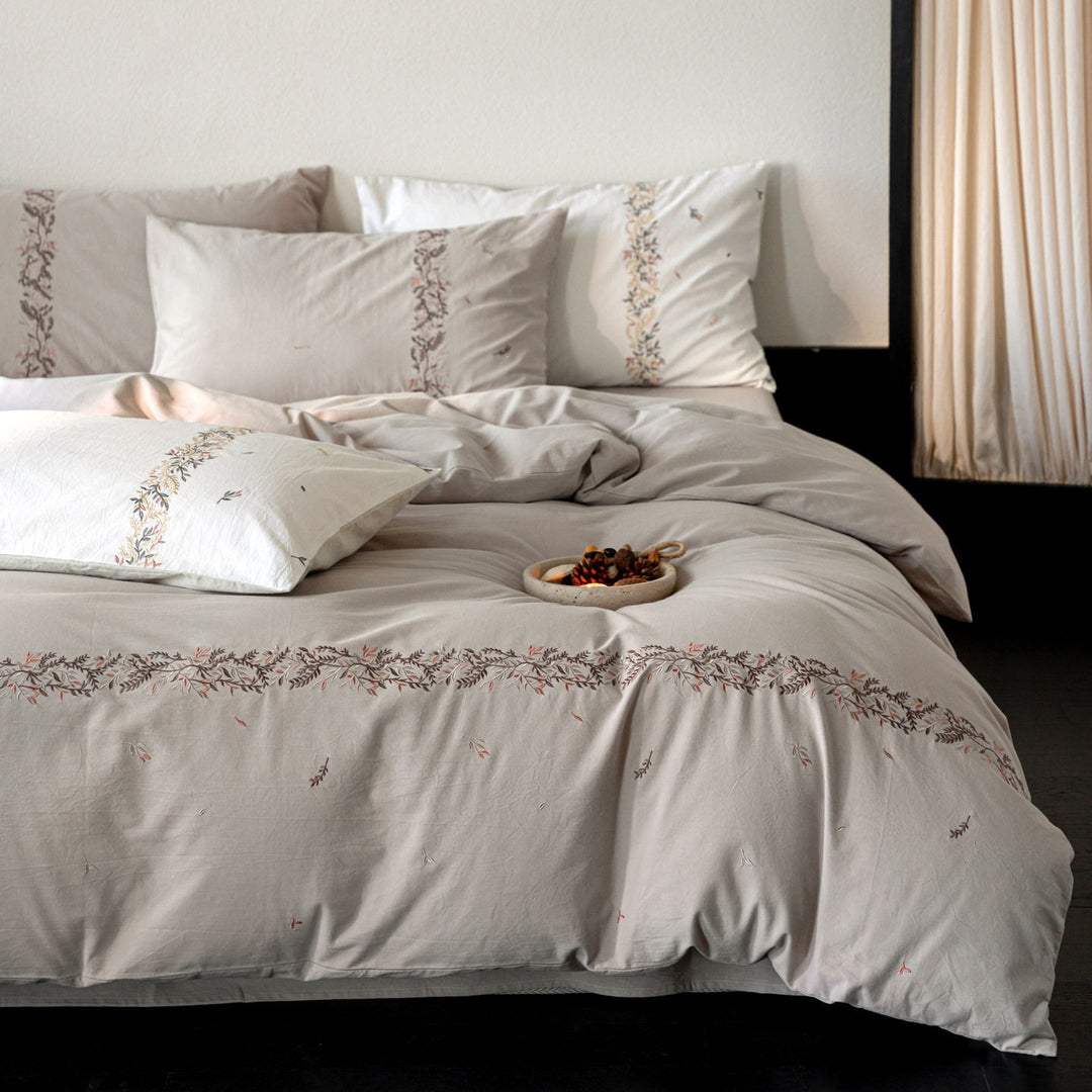 Embroidered cotton percale duvet cover set with fine floral border