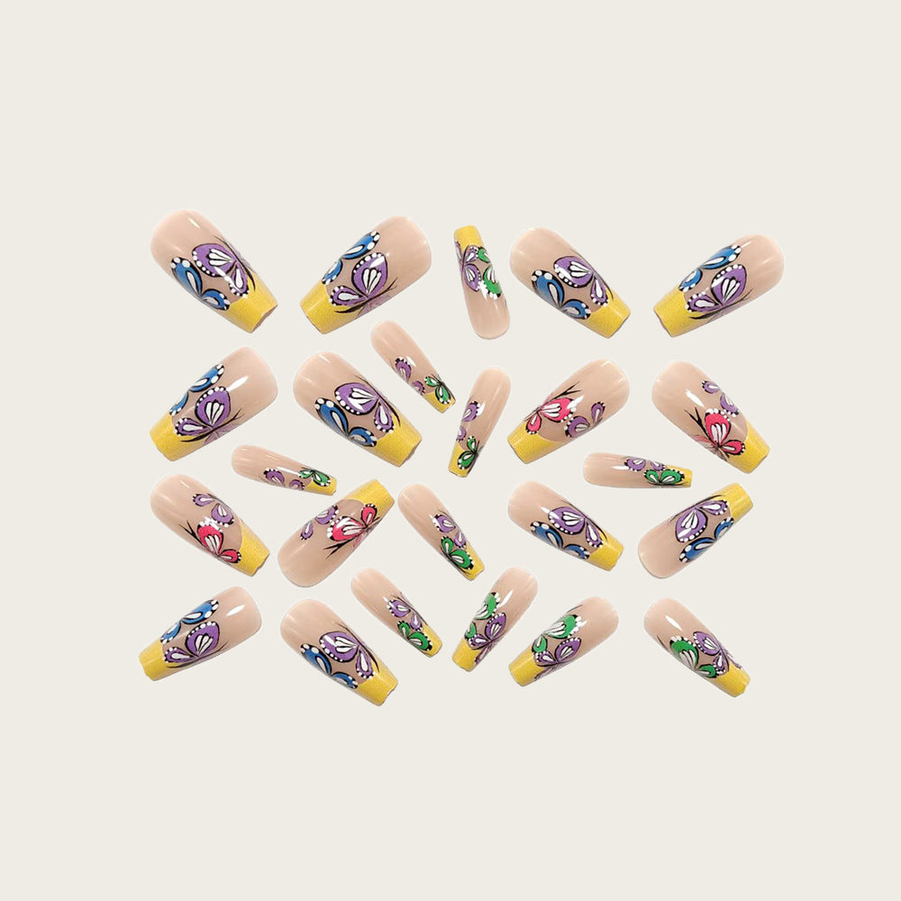 Nail set with intricate butterfly design Kalsten