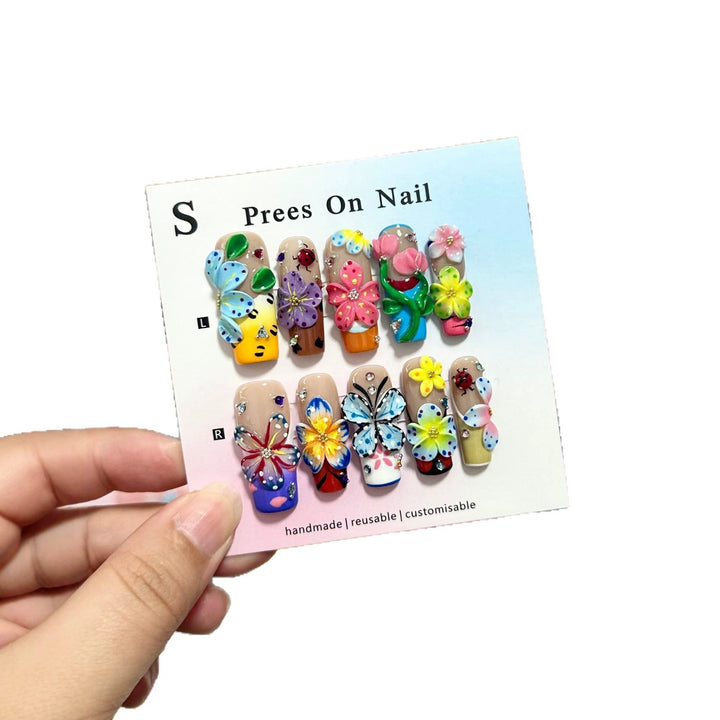 Artistic Press-On Nail Art Set with Vibrant Flower and Butterfly Designs