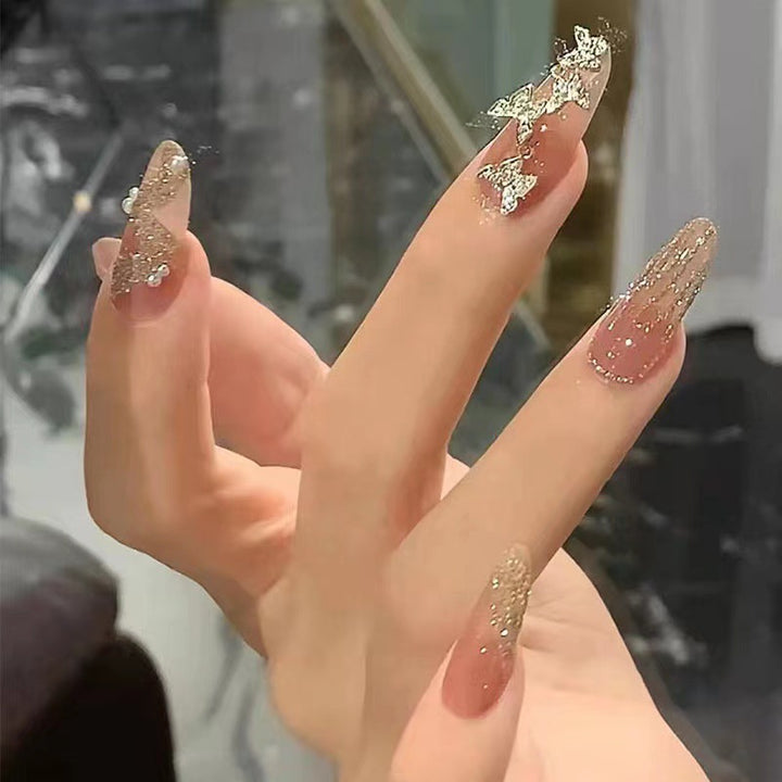 Glamorous artificial nails with sparkling accents Kalsten