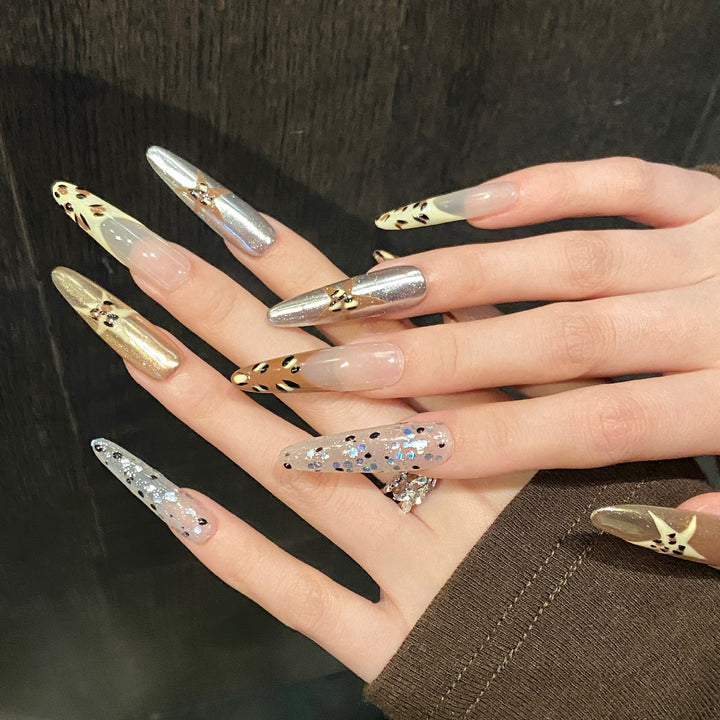 Artistic Press-On Nail Design Set with Metallic and Glitter Accents