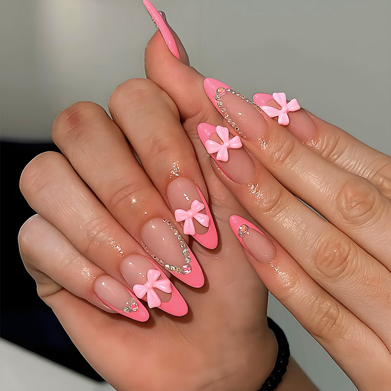 Artificial nail set with playful floral decorations and elegant glitter accents Kalsten