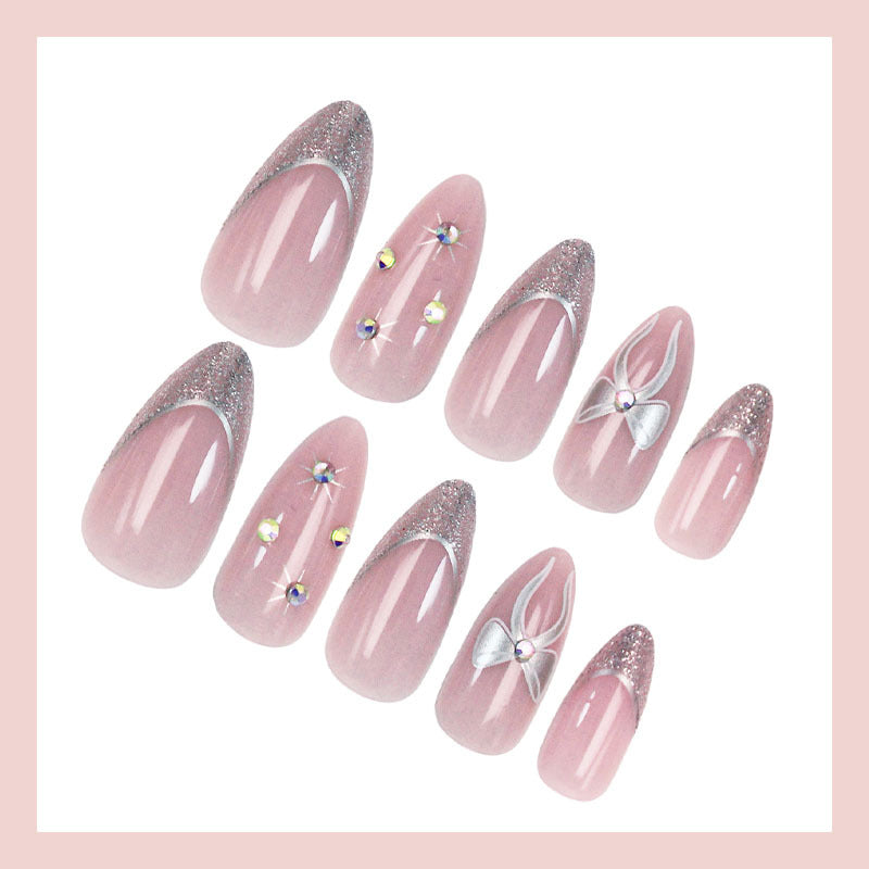 Artificial nail set with glamorous glitter and flower accents Kalsten