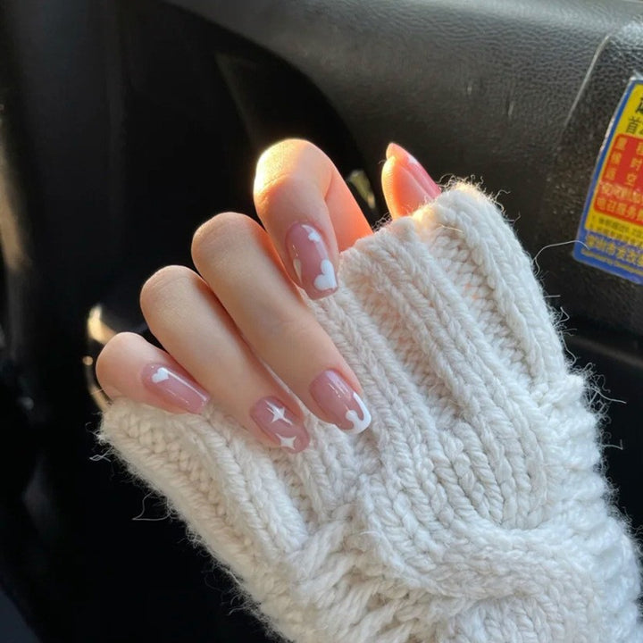 Artificial nails with elegant bow accents and pearl decorations Kalsten