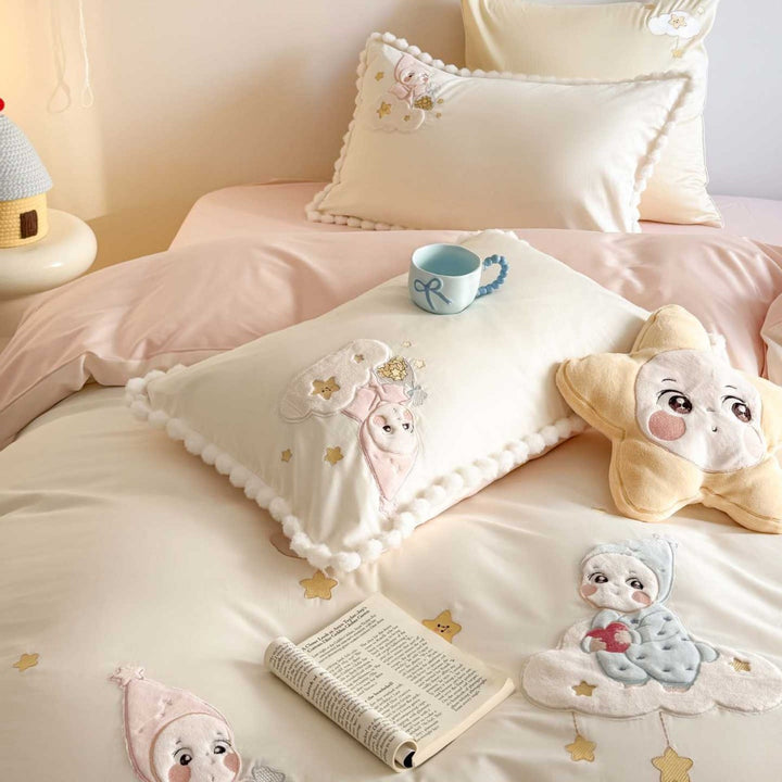 Bedding set for children with stitched cloud and star appliqués