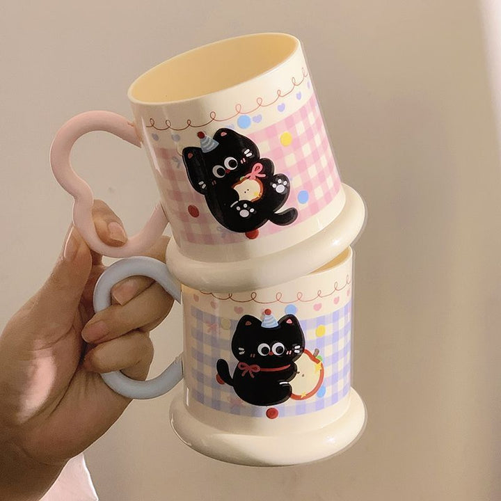 Ceramic mug with playful cat motif Kalsten
