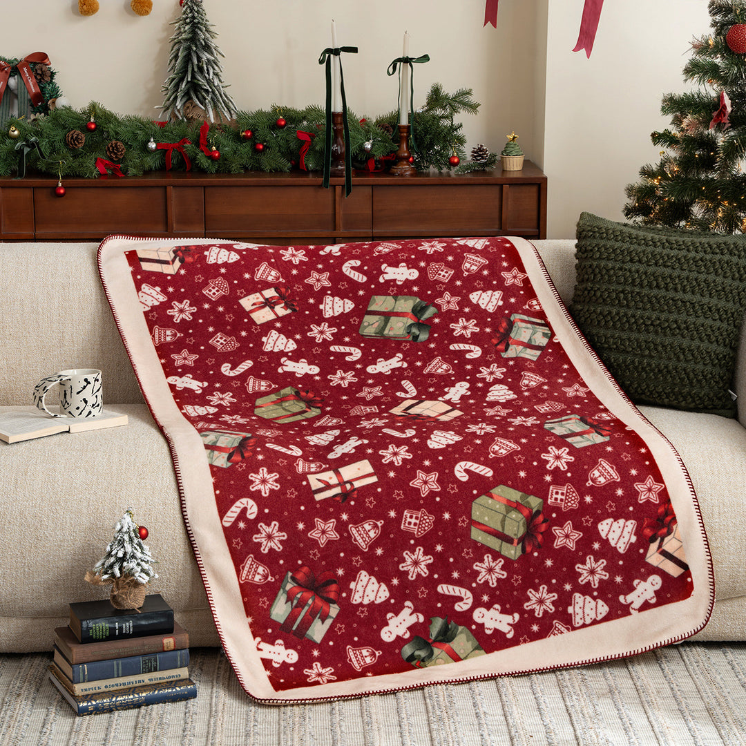 Soft Christmas fleece blanket with gift and gingerbread motif Kalsten