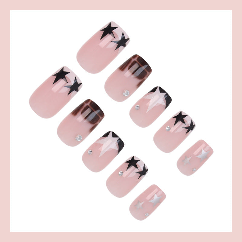 Acrylic nail set with glamorous star and glitter accents Kalsten