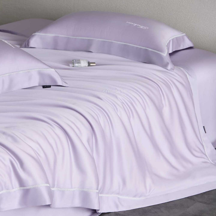 Silky-smooth cotton satin bedding set with fine decorative ribbon and pillowcases