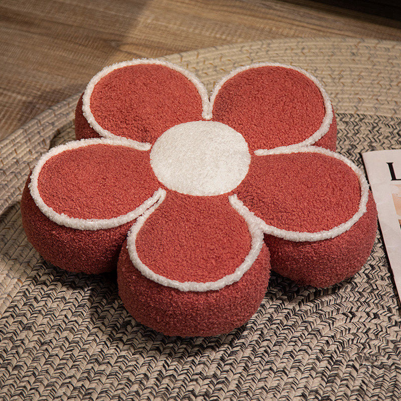 Padded seat cushion in flower shape with faux leather center piece and fluffy edge padding
