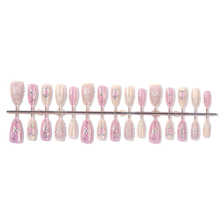 Artificial nail set with floral accents and glittering details Kalsten