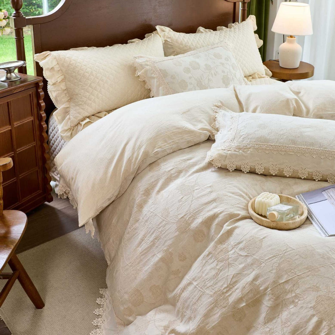 Vintage-inspired cotton-linen bedding set with lace trim and quilting pattern