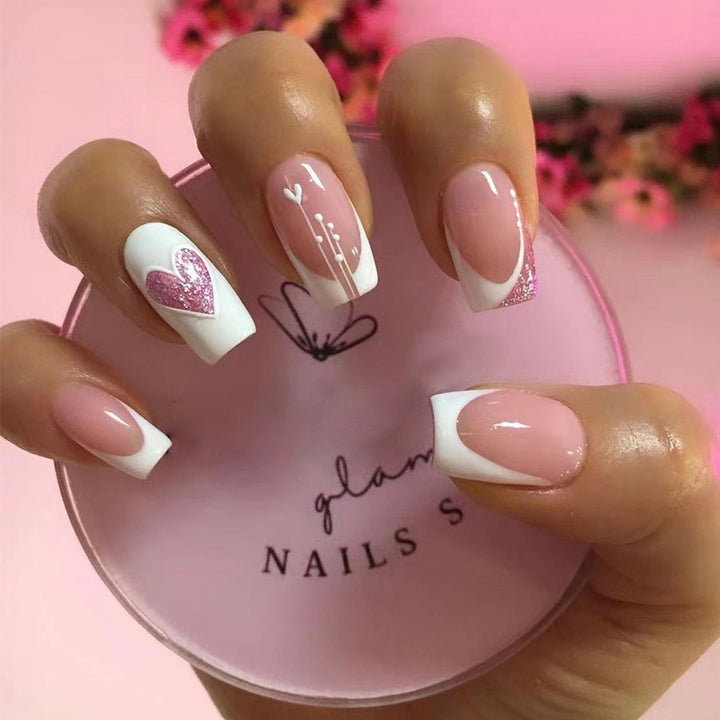 Artful nail designs with heart and glitter accents Kalsten