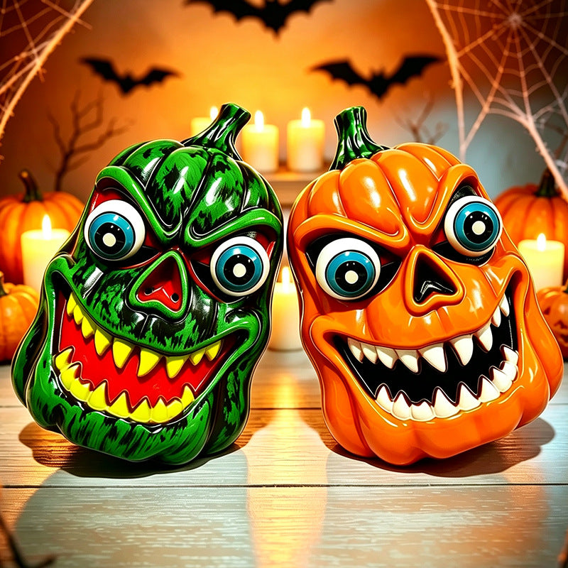Scary Halloween pumpkin decoration figure with candy compartment, LED eyes and distinctive spooky face