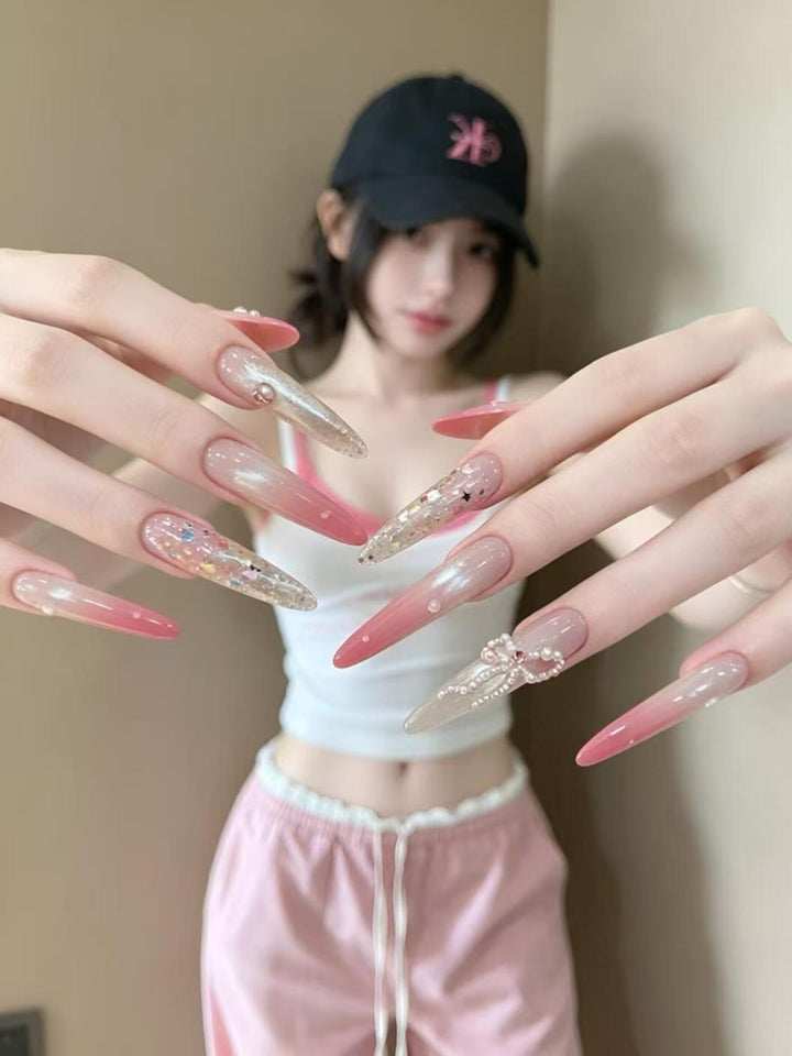Elegant Stiletto Nail Extensions with Rhinestone Accents