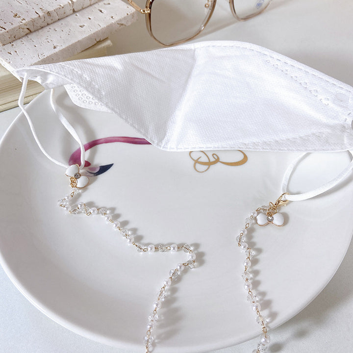 Elegant earrings with pearls and flower pendants Kalsten